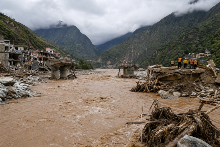 Editorial illustration for At Least 160 Dead After Flash Floods Sweep Nepal-Tibet Border
