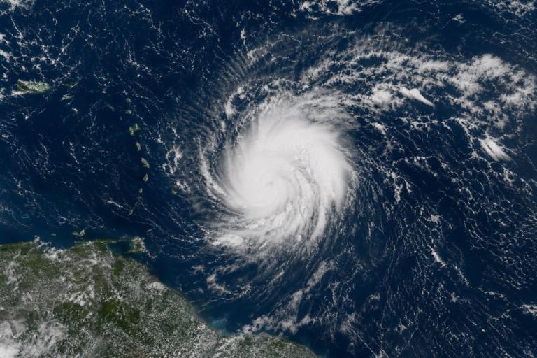 Editorial illustration for Tropical Storm Dolly forms in Atlantic, with heavy rain possible in Caribbean