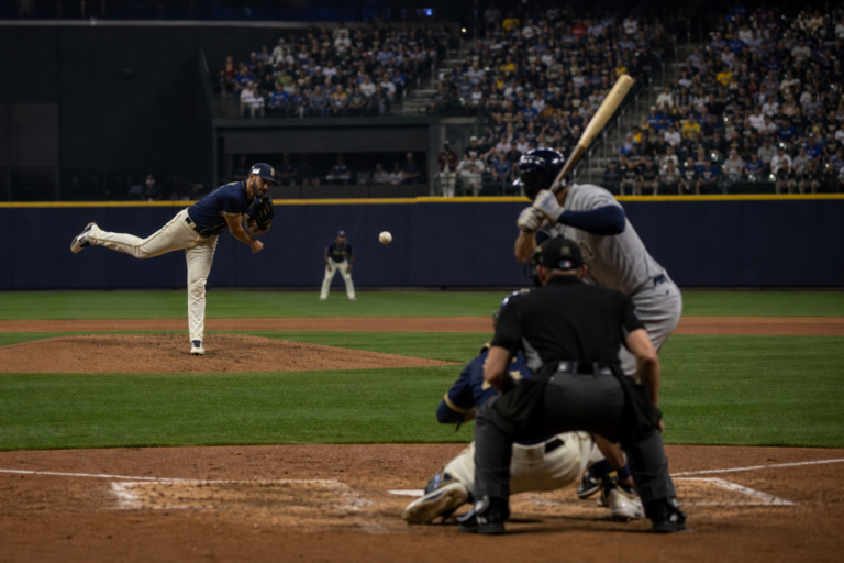 Editorial illustration for Logan Henderson’s one-hit start powers Brewers past Rangers, 6-1