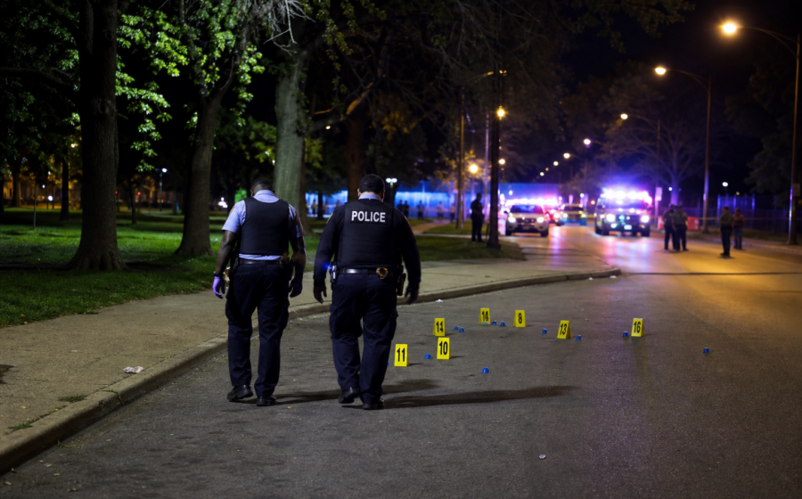 Editorial illustration for Ten Shot Near Washington Park as Chicago Police Hunt for Answers After Deadly Crowd Shooting