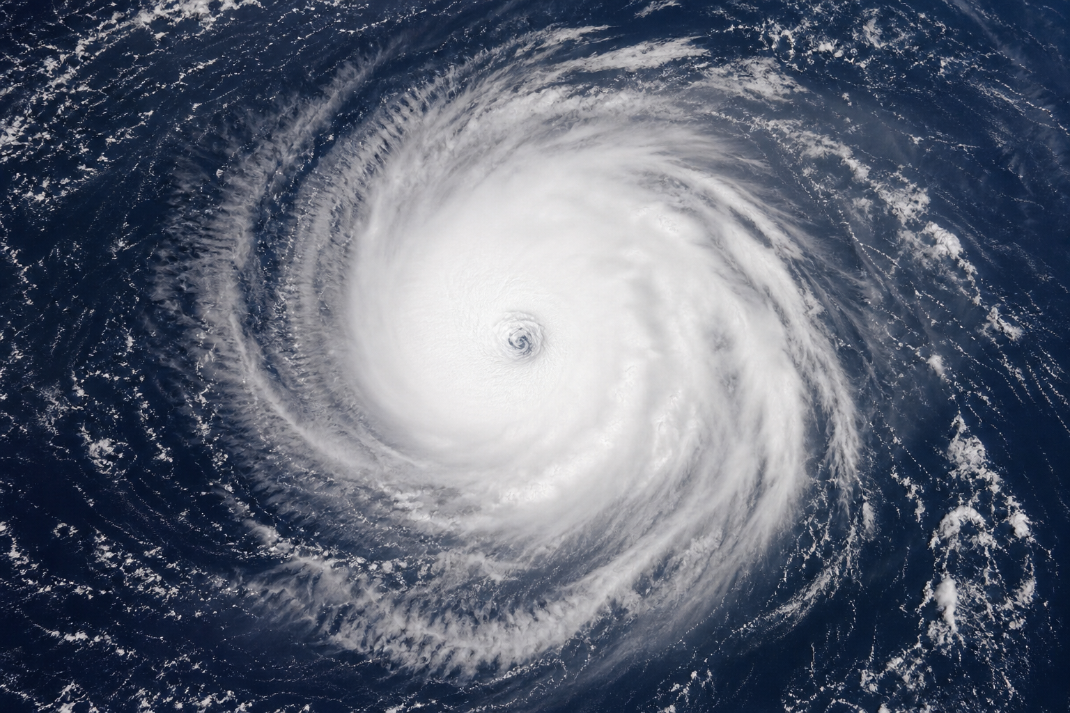 Editorial illustration for Hurricane Karina Is Far From Land, but Its Ocean Swells Still Pose a Coastal Risk